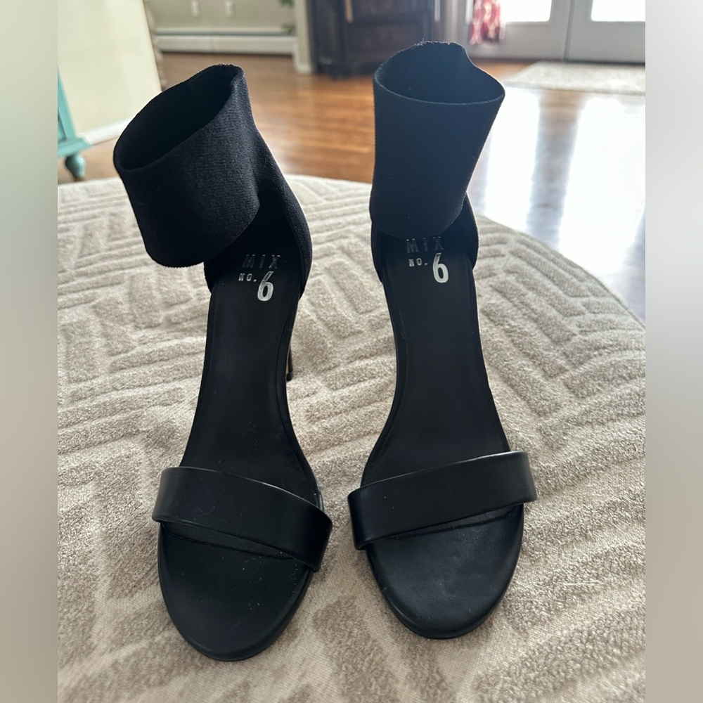 Women's black open toe stilettos. Size 6.5, like new.
